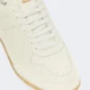 Baskets basses en cuir vieilli, blanches