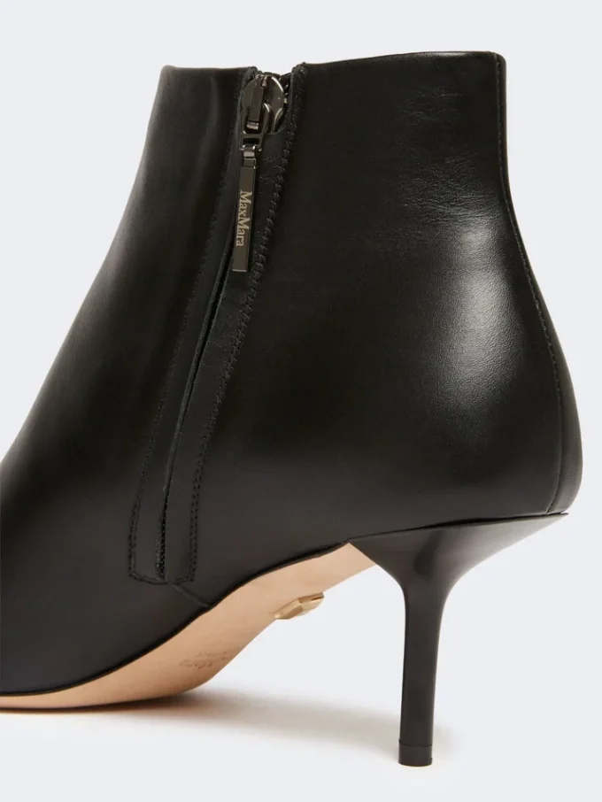 Bottines en cuir à fermeture éclair, noires