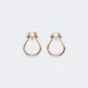 Boucles d’oreilles Monogram en métal doré Boucles d’oreilles Monogram en métal doré