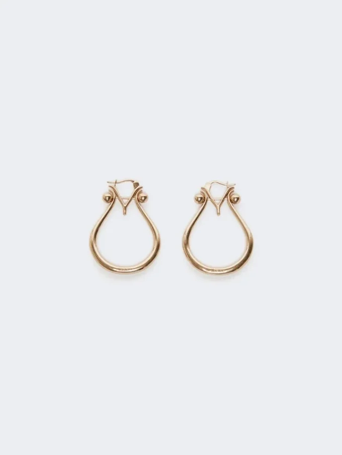 Boucles d’oreilles Monogram en métal doré Boucles d’oreilles Monogram en métal doré