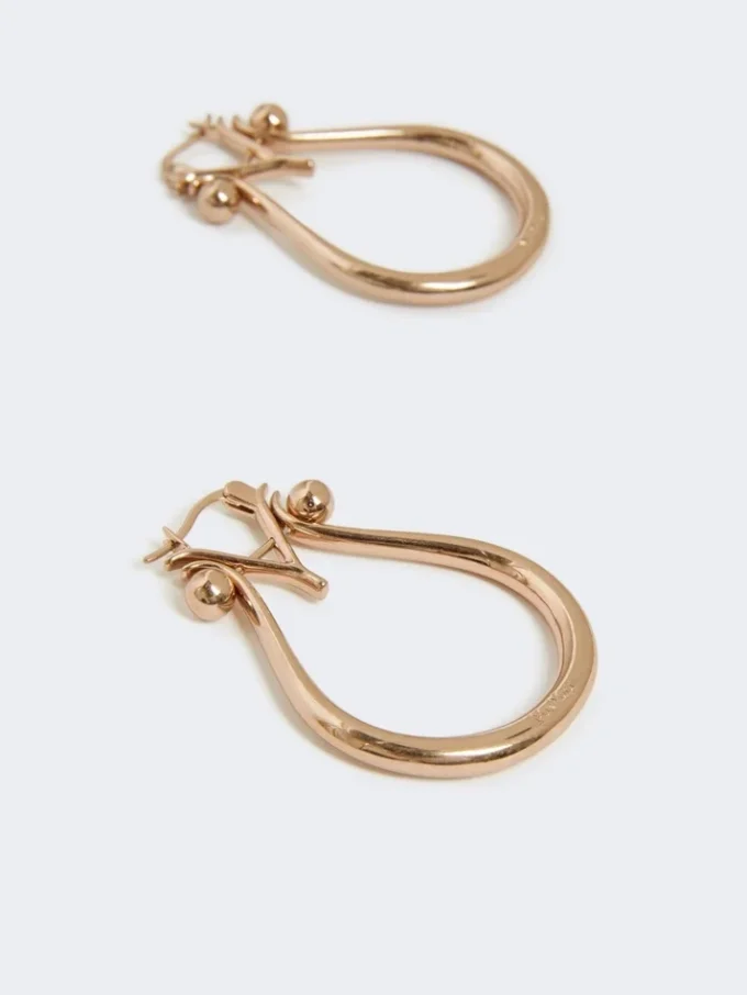 Boucles d’oreilles Monogram en métal doré Boucles d’oreilles Monogram en métal doré