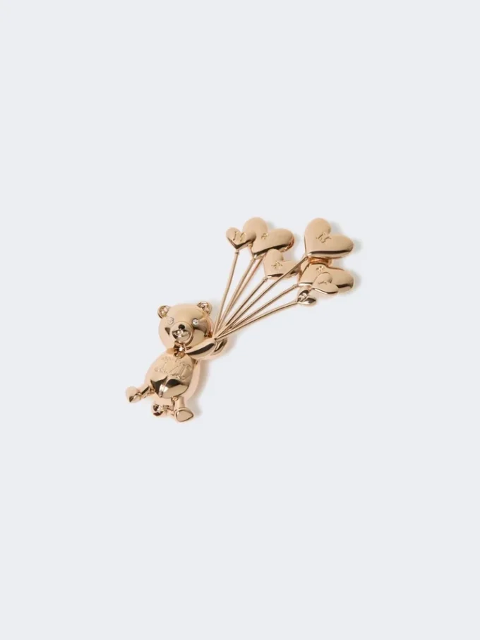 Broche en métal avec strass,