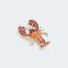 Broche en métal avec strass, rouge foncé Broche en métal avec strass, rouge foncé