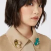 Broche en résine et verre, marron Broche en résine et verre, marron