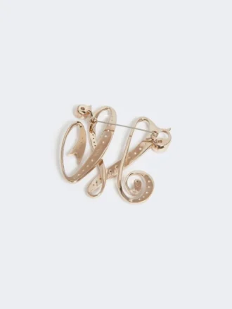 Broche monogramme avec strass, ivoire