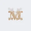Broche monogramme ornée de cristaux, blanc optique Broche monogramme ornée de cristaux, blanc optique