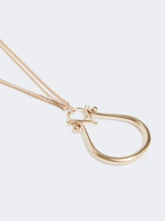 Collier avec pendentif monogramme, doré