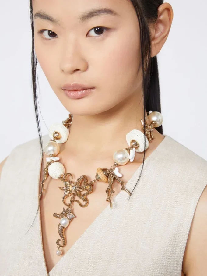 Collier ras-du-cou « Abissi » en métal et raphia, doré