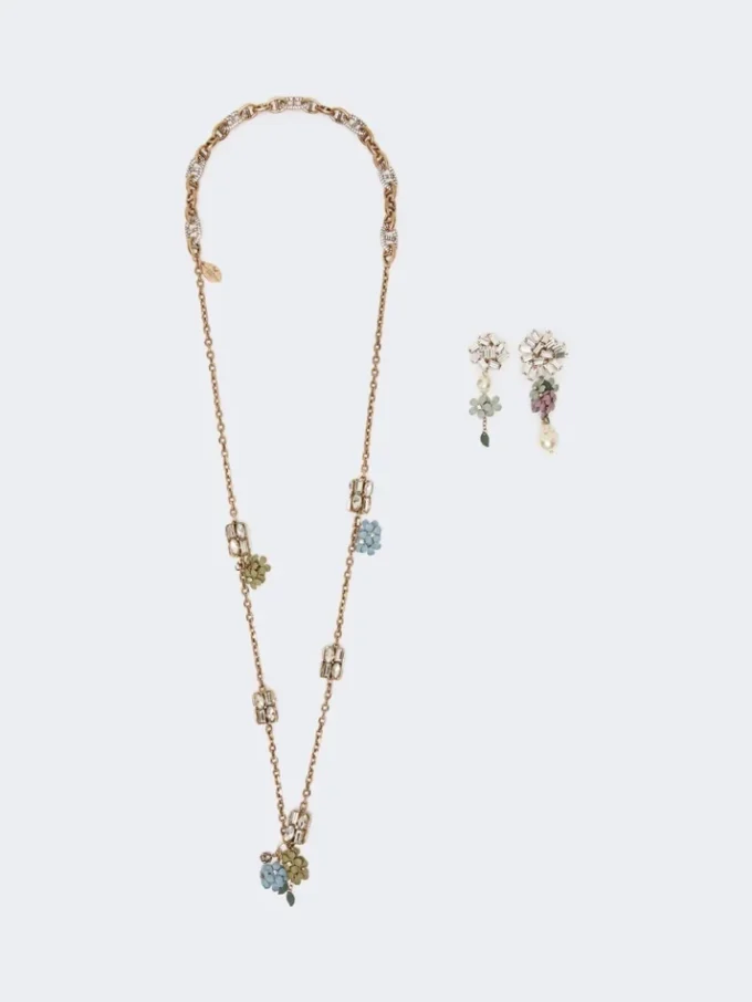 Ensemble avec détails en forme de fleurs et de cristaux, doré Ensemble avec détails en forme de fleurs et de cristaux, doré