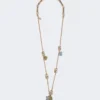 Ensemble avec détails en forme de fleurs et de cristaux, doré Ensemble avec détails en forme de fleurs et de cristaux, doré