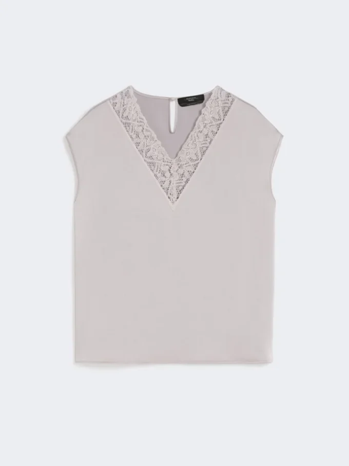 Haut féminin en satin, couleur nude Haut féminin en satin, couleur nude