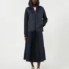 Veste matelassée à capuche en toile déperlante et jersey, bleu marine Veste matelassée à capuche en toile déperlante et jersey, bleu marine