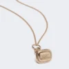 Long collier avec pendentif en forme de sceau, doré Long collier avec pendentif en forme de sceau, doré