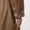 Longue parka matelassée en toile déperlante, couleur tabac Longue parka matelassée en toile déperlante, couleur tabac