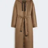 Longue parka matelassée en toile déperlante, couleur tabac Longue parka matelassée en toile déperlante, couleur tabac