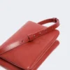 Mini-sac Soffy en cuir nappa matelassé, rouge brique