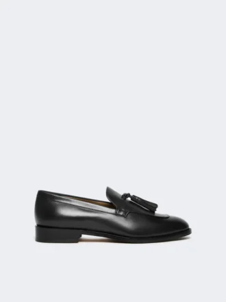 Mocassins en cuir à pompons, noirs