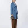 Pantalon en tissu enduit, couleur tabac