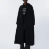 Pantalon en tissu enduit, noir Pantalon en tissu enduit, noir