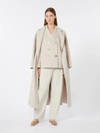 Pantalon à jambes évasées en tissu enduit, couleur sable Pantalon à jambes évasées en tissu enduit, couleur sable