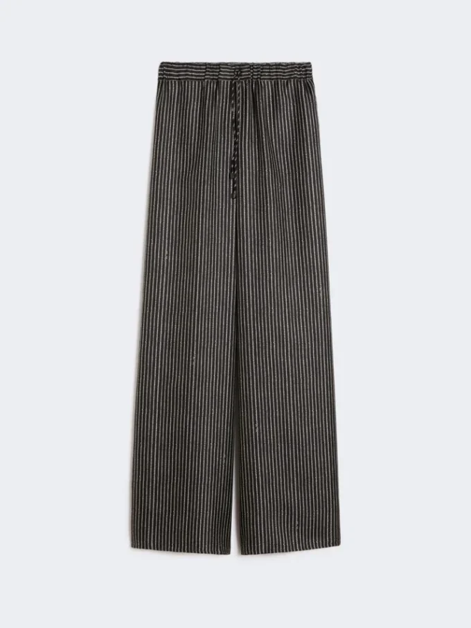 Pantalon large en soie imprimée, noir et blanc Pantalon large en soie imprimée, noir et blanc