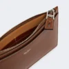 Pochette en cuir avec dragonne, brun ambré Pochette en cuir avec dragonne, brun ambré