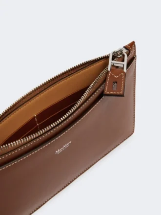 Pochette en cuir avec dragonne, brun ambré