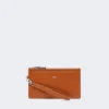 Pochette en cuir avec dragonne, couleur rouille Pochette en cuir avec dragonne, couleur rouille