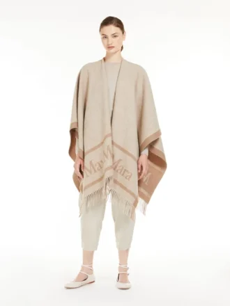 Poncho en laine jacquard, beige Poncho en laine jacquard, beige