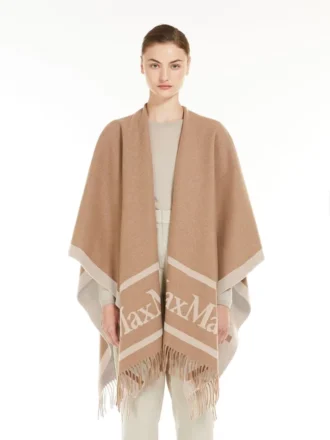 Poncho en laine jacquard, couleur camel Poncho en laine jacquard, couleur camel