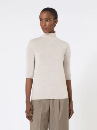 Pull à col roulé en laine au point jersey, couleur poudre