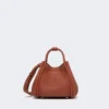 Très petit sac marin en cuir, couleur rouille Très petit sac marin en cuir, couleur rouille