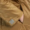 Veste matelassée à capuche hydrofuge, couleur caramel Veste matelassée à capuche hydrofuge, couleur caramel